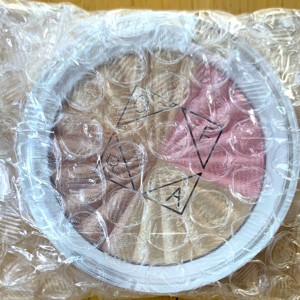 OFRA Shimmering Baked Swirled Highlighter in All of the Lights
